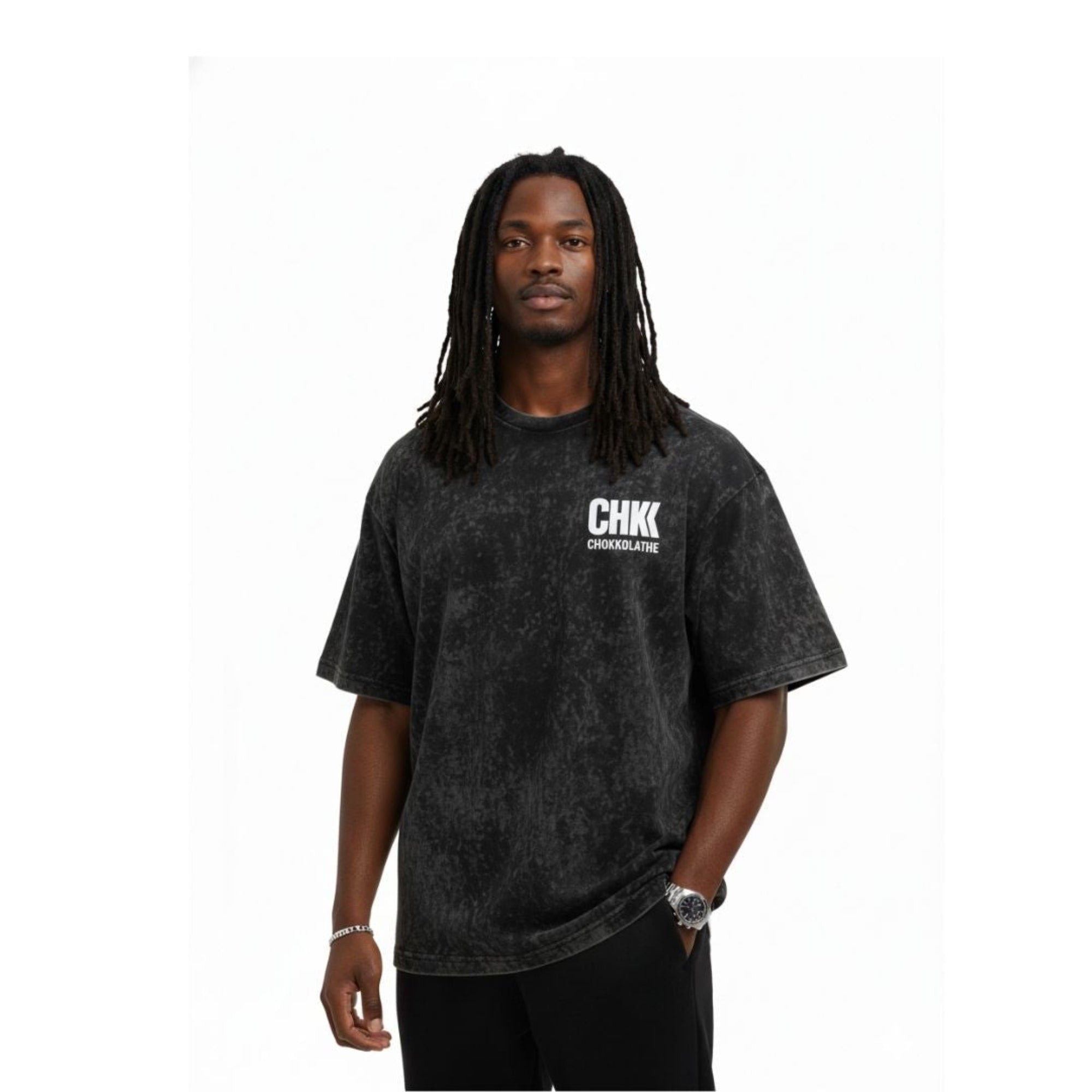 Person wearing a black t-shirt with a logo on a white background